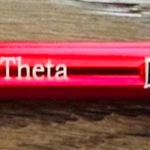 May include: A red pen with silver accents and the text "Delta Sigma Theta" engraved on the side.