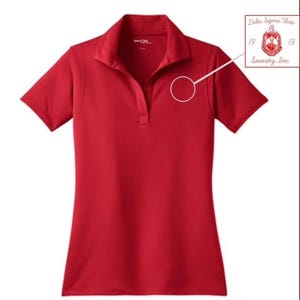 May include: Red short-sleeved polo shirt with a small embroidered logo on the left chest. The logo is a red and white crest with the text "Delta Sigma Theta Sorority, Inc." and the numbers "1913".
