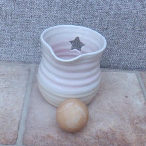 Handmade Egg separator jug in pale pink glaze