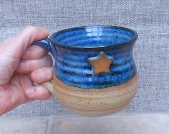 Handmade coffee mug tea cup with a star stoneware wheel thrown ceramic: cobalt blue glaze
