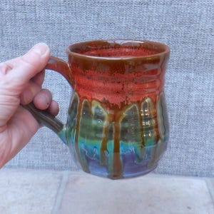 Handmade mug coffee tea cup hand thrown in stoneware pottery wheelthrown ceramic reactive glazes.