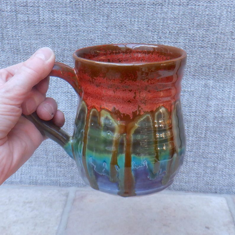 Handmade mug coffee tea cup hand thrown in stoneware pottery wheelthrown ceramic reactive glazes.