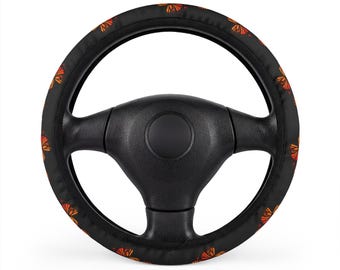 Funda para volante de coche con estampado de mariposas, color negro con diseño de mariposa monarca naranja.