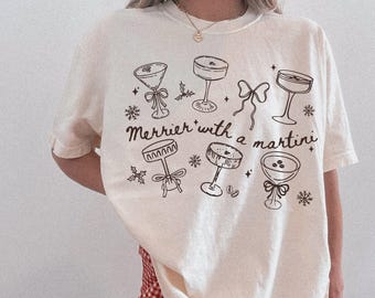 Comfort Colors Merrier with a Martini Shirt, Christmas Holiday Cocktail Crew Shirt, Martini Bow Tee, Christmas Spirits T-Shirt, Gift For Her