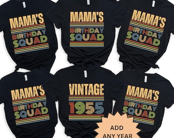 May include: Black t-shirts with the text "MAMA'S BIRTHDAY SQUAD" in a retro design. One shirt says "VINTAGE 1955". A starburst graphic says "ADD ANY YEAR". The shirts have a crew neck and short sleeves.