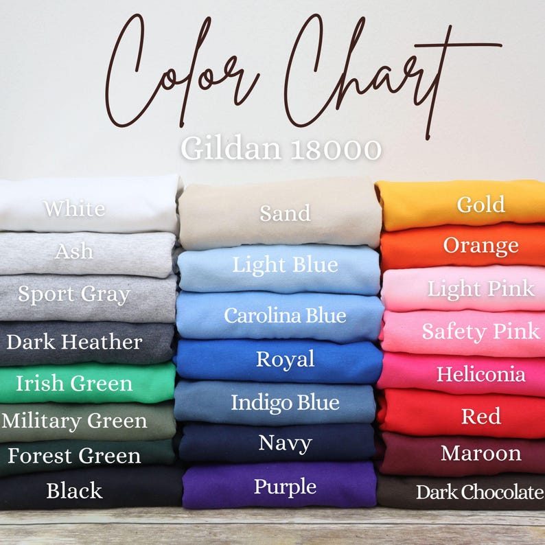 May include: Color chart of Gildan 18000 apparel in various colors, including white, black, and navy. Other colors include light blue, orange, and red. The text "Color Chart" is written in cursive at the top of the image.