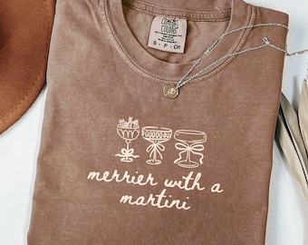 Comfort Colors Merrier with a Martini Shirt, Christmas Holiday Cocktail Crew Shirt, Martini Bow Tee, Christmas Spirits T-Shirt, Gift For Her