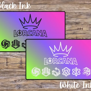 May include: Two rectangular designs with a gradient background of green, purple, and pink. The top design has black text that reads "Black Ink" and the word "LORCANA" with a crown above it. The bottom design has white text that reads "White Ink".