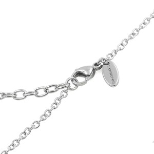 May include: A silver chain necklace with a lobster clasp closure and a small silver tag with the text "ICONIQUE" engraved on it.
