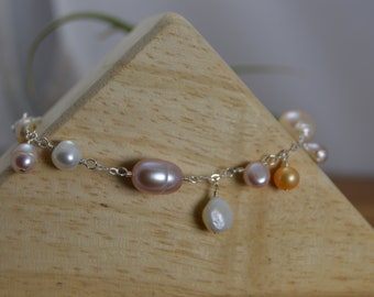 Avant-garde Freshwater Pearl bracelet. Pale peach, mauve, white, pink Freshwater Pearl bracelet, Sterling silver, wedding, bridal jewelry.