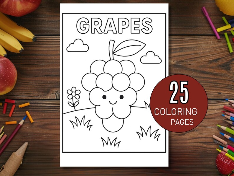 May include: A coloring book page with the word "GRAPES" above a cartoon bunch of grapes, clouds, and a flower. A circular sticker on the right says "25 COLORING PAGES". The page is surrounded by colored pencils and fruit on a wooden surface.