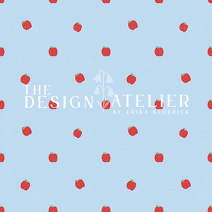 May include: A light blue pattern featuring evenly spaced red apples with green stems. The text "THE DESIGN ATELIER BY ERIKA KENDRICK" is in white. This design is suitable for various applications.