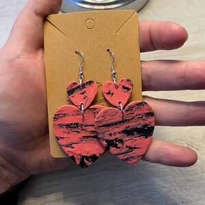 Heart shaped dangling earrings