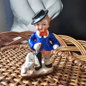 Vintage boy blue with dog figurine
