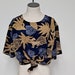 see more listings in the blouses.sweaters.vests section