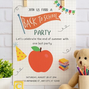 May include: A Back to School Party invitation with an orange banner, apple illustration, and party hat. The invitation is held by wooden clothespins. A teddy bear, pencils, and ABC blocks are in the foreground.