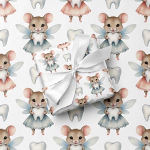 May include: A set of three ceramic mugs with a speckled, matte finish. The mugs are in shades of cream, light gray, and dark gray. Each mug has a simple, minimalist design and a rounded handle. The mugs are suitable for coffee, tea, or other beverages.