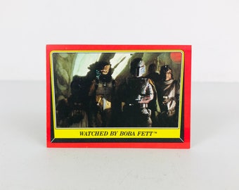 1983 Topps Boba Fett Trading Card Star Wars Return of the Jedi Movie Series, Card #24 "Watched By Boba Fett", Jabba the Hutt's Palace Scene