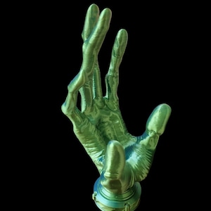3d printed alien hand controllers stand for desk