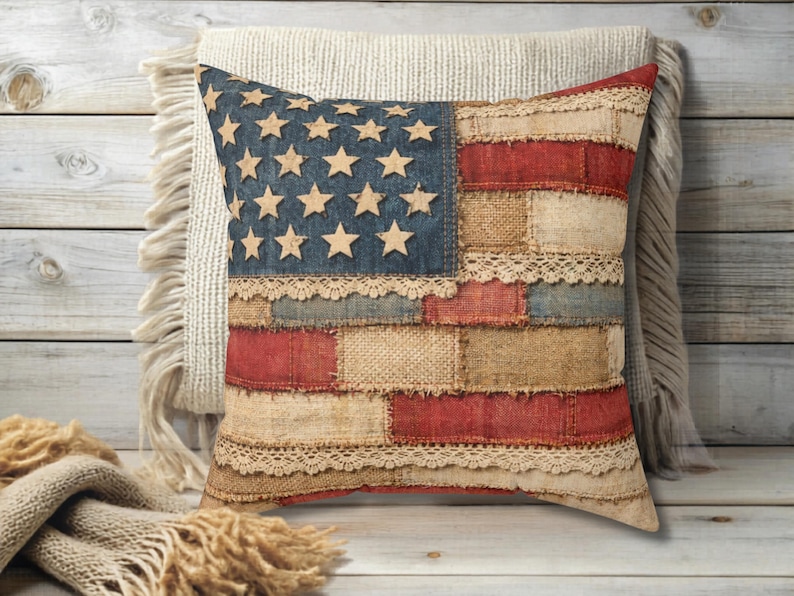 Rustic American flag patchwork pillow with vintage fabric texture on neutral farmhouse chair with cozy blanket