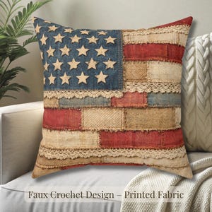 May include: A decorative throw pillow with a distressed American flag design. The pillow features a blue denim field with wooden stars, red and beige patchwork stripes, and lace trim. The text "Faux Crochet Design - Printed Fabric" is visible.