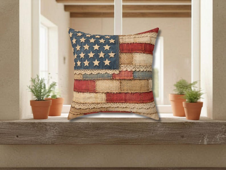 Patriotic patchwork American flag throw pillow styled on wood surface with rustic decor and neutral tones