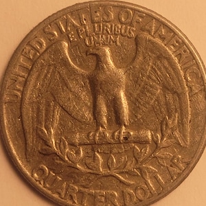 1966 U.S quarter,no mint mark,letter errors