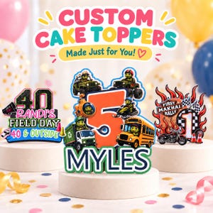 May include: Three custom cake toppers featuring colorful designs. One displays '40 RANDI'S FIELD DAY', another shows a large orange '5' with 'MYLES' and various vehicles, and the third features 'FIRST MAKHAI RALLY' with flames and a motorcycle graphic.