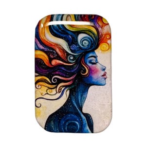 May include: A rectangular art piece featuring a profile of a woman with closed eyes and vibrant, colorful hair. The woman's skin is blue, with pink and purple accents on her face. The hair is a mix of rainbow colors, and the background is a light beige.