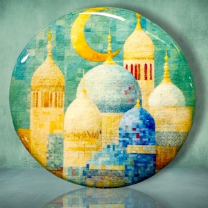 May include: A circular wall art piece featuring a mosaic-style illustration of architectural domes and towers in shades of blue, yellow, and white. A prominent golden crescent moon is positioned in the upper section of the sky.