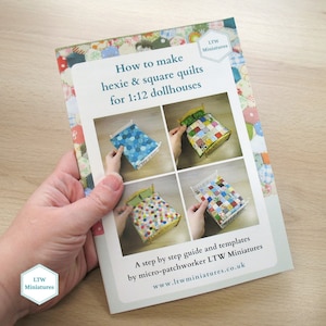 May include: A guidebook with a white cover and colourful images of miniature quilts on beds. The title is "How to make hexie & square quilts for 1:12 dollhouses". The book is by micro-patchworker LTW Miniatures and includes a step-by-step guide and templates.