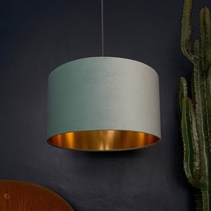 Bright Sea Green Velvet Drum Lampshade With Gold Lining. Handmade to order in the UK with 12 different sizes to choose from.