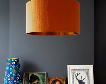 Burnt Orange Silk Dupion Drum Lampshade With Gold or Copper Foil Lining. Handmade to order in the UK with 12 different sizes available.