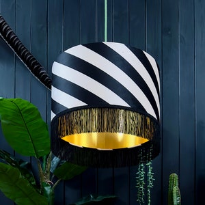 Liquorice Black and White Helter Skelter Striped Velvet Lampshades With Gold Foil Lining and Black Fringing. Statement Monochrome Lighting