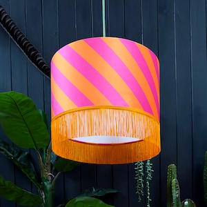 Tutti Frutti Helter Skelter Velvet Lampshades with Pumpkin Orange Fringing. Pink and Orange Tilted Stripe Lampshades