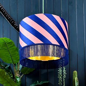 Peach Fuzz Helter Skelter Velvet Lampshades With Gold Foil Lining and Indigo Fringing