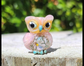 OWL : Lampwork glass fledgling with a flower in the belly.