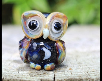 OWL : Lampwork glass fledgling with a flower in the belly.