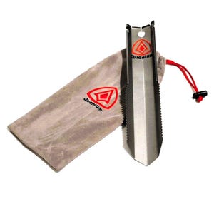 May include: A silver metal trowel with a serrated edge and a red logo, alongside a grey drawstring bag with a matching logo. The trowel is designed for digging and has a robust construction. The bag is made of a soft material.