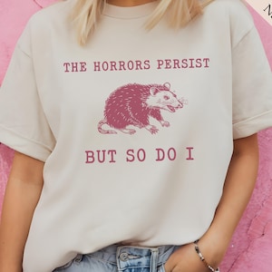 The Horrors Persist But So Do I, Sarcastic Shirt, Meme Anxiety T-Shirt, Funny Mental Health Shirt, Gift for Raccoon Lover, Oppossum T-Shirt