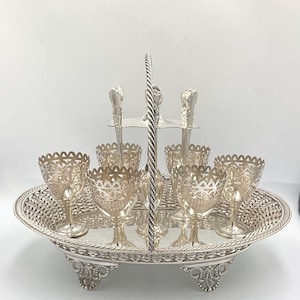 Antique  Egg Cup Cruet, Lee and Wigfull, Sheffield, U.K Six Pierced Egg Cups and Spoons in Elegant Basket with Stylish Handle