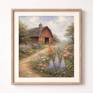 May include: Framed art print depicting a red barn with an open door, surrounded by a field of vibrant wildflowers. A dirt path leads to the barn, under a cloudy blue sky. The artwork is in a light wooden frame.