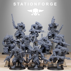 May include: A group of nine gray plastic miniature figures of rat-like creatures wearing military uniforms and holding weapons. The figures are posed in various action stances. The figures are standing on a gray surface. The text "STATIONFORGE" is printed in white at the top of the image.