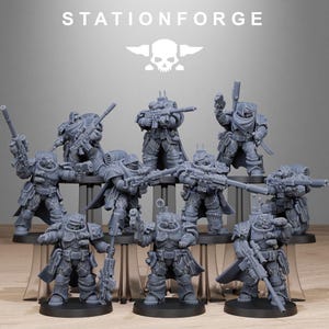 May include: A collection of gray miniature figurines of armored soldiers, each holding a rifle. The figurines are arranged on a display stand. The text "STATIONFORGE" and a skull logo are at the top.