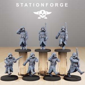May include: A collection of gray miniature figurines of soldiers in uniform, some with rifles and gas masks. The figurines are on black bases, with the text "STATIONFORGE" and a skull logo above them.