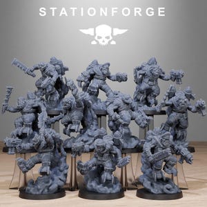 May include: A collection of gray miniature figurines of Orc-like characters in dynamic poses, some wielding weapons. The figures are on a display stand with the text "STATIONFORGE" and a skull logo.