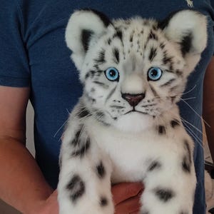Realistic toy snow leopard cub teddy