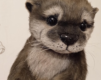 realistic toy baby otter