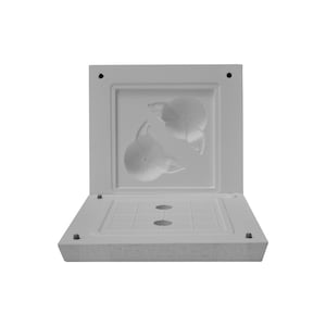 May include: White ceramic mould with two round impressions, possibly for making soap or candles. The mould is open and the bottom section is visible.