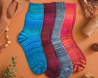 May include: Four pairs of colorful striped socks in blue, red, gray, and orange. The socks are made of a soft, knitted fabric.
